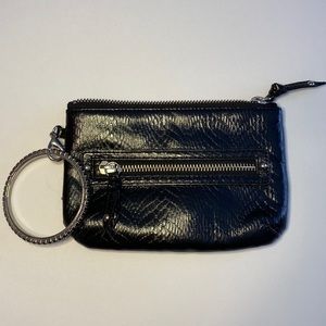 Black faux leather wristlet with rhinestone bangle.